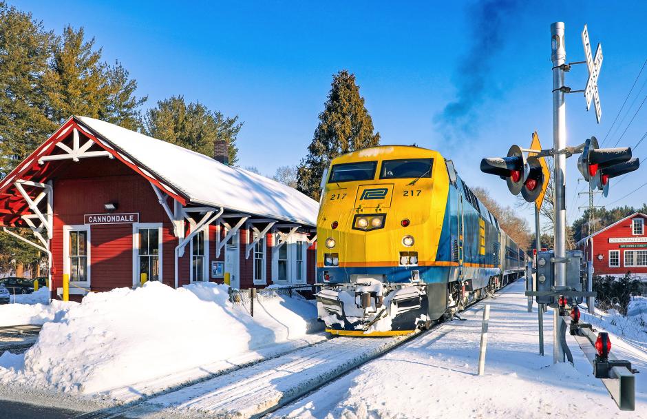 Metro-North Train 1841, led by Penn Central heritage P32AC-DM No. 217, departs the classic Victorian-style Cannondale, Connecticut station, built in 1892, on Wednesday, January 28, 2026. Framed by the historic charm of the Danbury Branch, the scene pairs railroad heritage with one of Connecticut’s most picturesque station buildings.