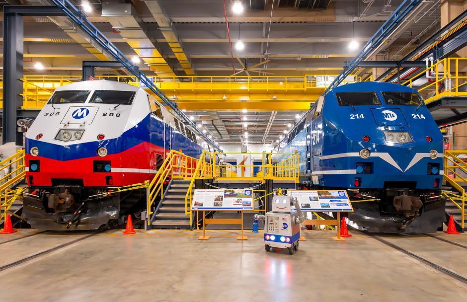 “Beach Ball” heritage locomotive P32AC-DM No. 208 and Employee Tribute locomotive No. 214 stand together at Metro-North’s Croton Harmon facility alongside the original Metro-Man, ready to welcome visitors on October 5, 2024, for the railroad’s first Open House in sixteen years.