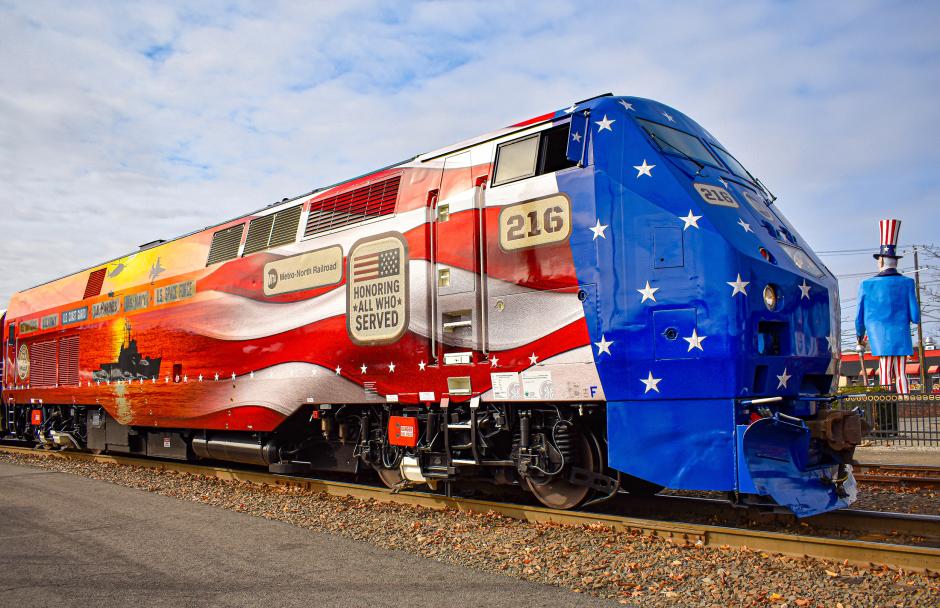 P32AC-DM No. 216, a tribute to veterans and service members, makes its debut appearance in Danbury, Connecticut, standing proudly beside the Danbury Railway Museum’s Uncle Sam statue in a fitting salute to service and railroad heritage.