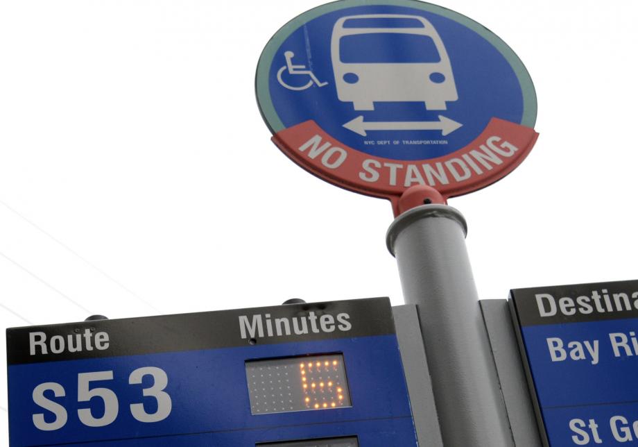 A blue, white, and red sign with a white icon on top and the "S53" down below. 