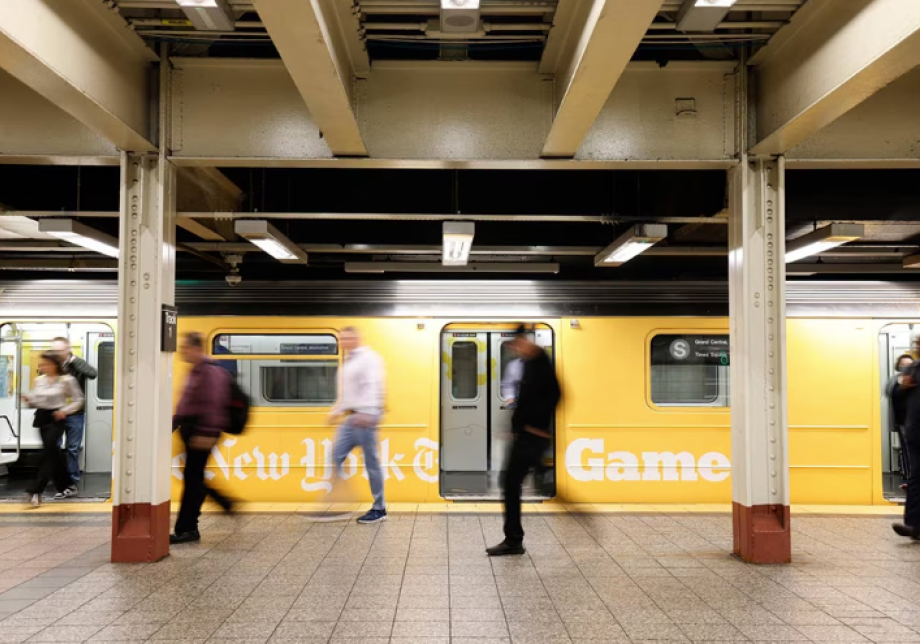 Photographs of people walking in subway station with a subway car wrapped in bright yellow that says "New York TImes Games"