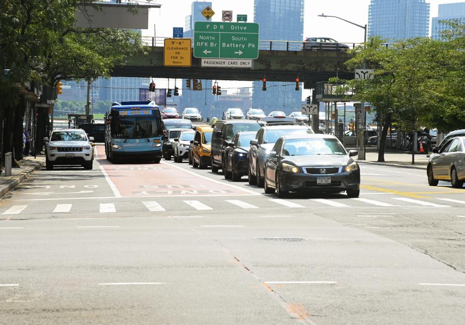 M34-SBS bus and cars on E 34 St