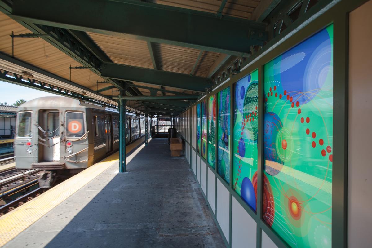 Artwork in laminated glass by Amy Cheng showing bright colors in abstract forms. 