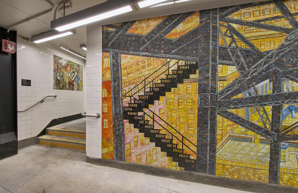 Mosaic walls in underground station environment.
