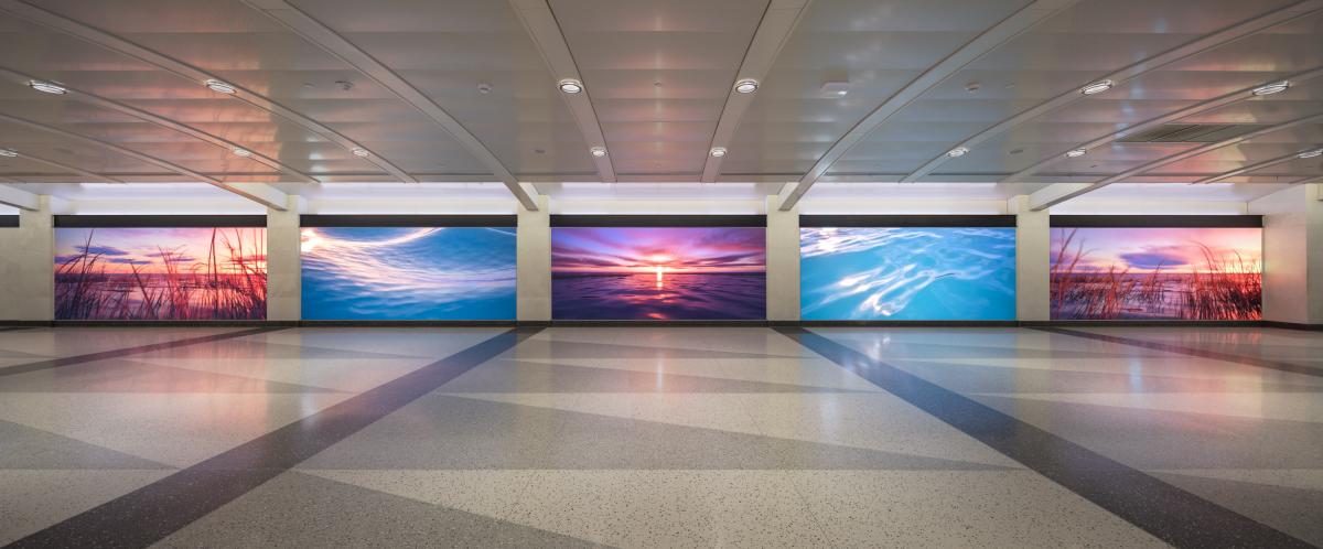 View of five large-scale digital screens at Grand Central Madison