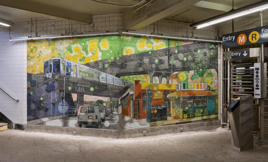 Large mosaic wall in underground station environment.