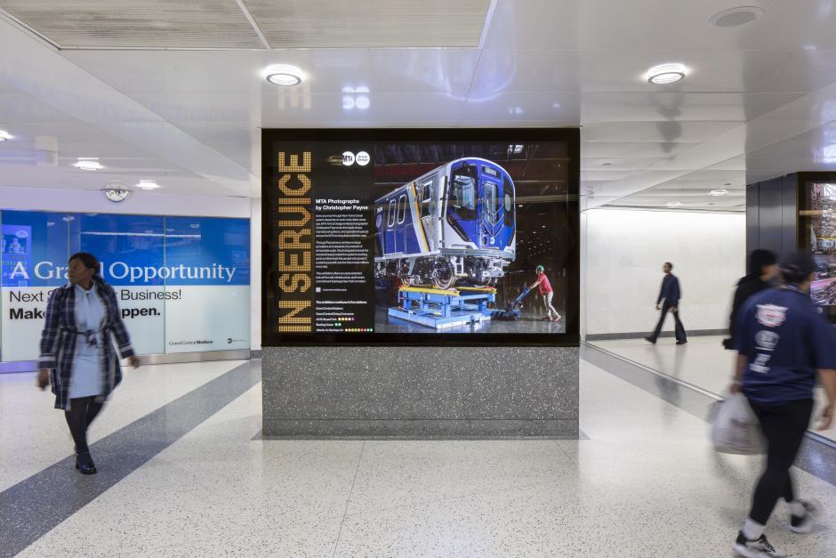 View of a lightbox with an image of subway car.