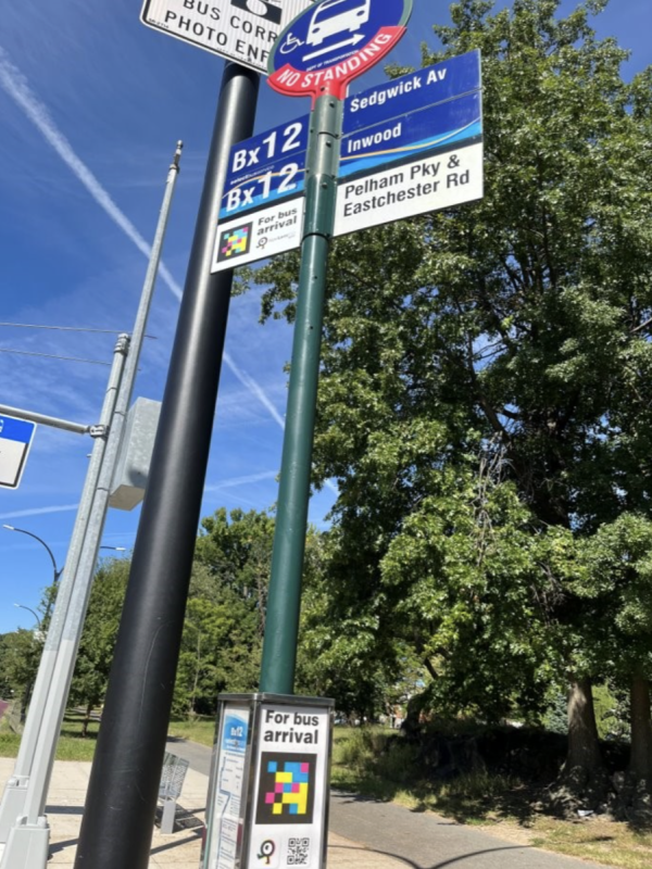 NaviLens codes on Bx12 bus stop pole.