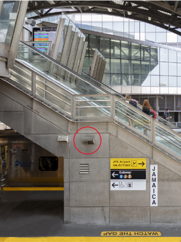 A wallmounted speaker representing more platform announcements